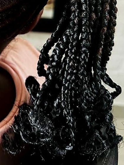 Braids finished with curly ends